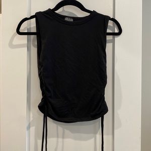 Never wore it! Stretchy crop top with adjustable sides
